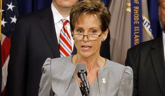 Kathleen Martin-Weis, acting director of the FDA office of criminal investigations, and Peter Neronha, U.S. attorney for the district of Rhode Island, announce a $500 million settlement with Internet giant Google over Canadian drug advertisements on Aug. 24, 2011, in Providence, R.I. (Associated Press)
