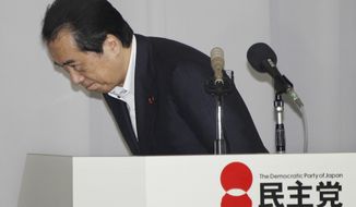 Japanese Prime Minister Naoto Kan bows after giving a speech at the Democratic Party of Japan lawmakers&#39; meeting in Tokyo, Friday, Aug. 26, 2011. Kan announced he was resigning after almost 15 months in office amid plunging approval ratings over his government&#39;s handling of the tsunami disaster and nuclear crisis. (AP Photo/Koji Sasahara)