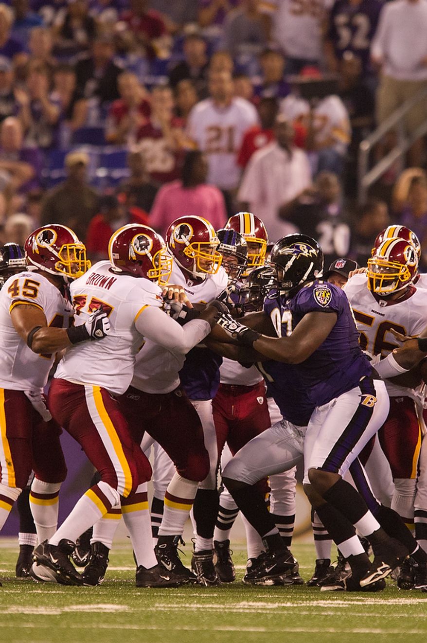 A fight between linemen breaks out after a play as the Washington Redskins take on the Baltimore Ravens in preseason football at M&amp;T Bank Stadium in Baltimore, MD, Thursday, August 25, 2011. (Andrew Harnik / The Washington Times)