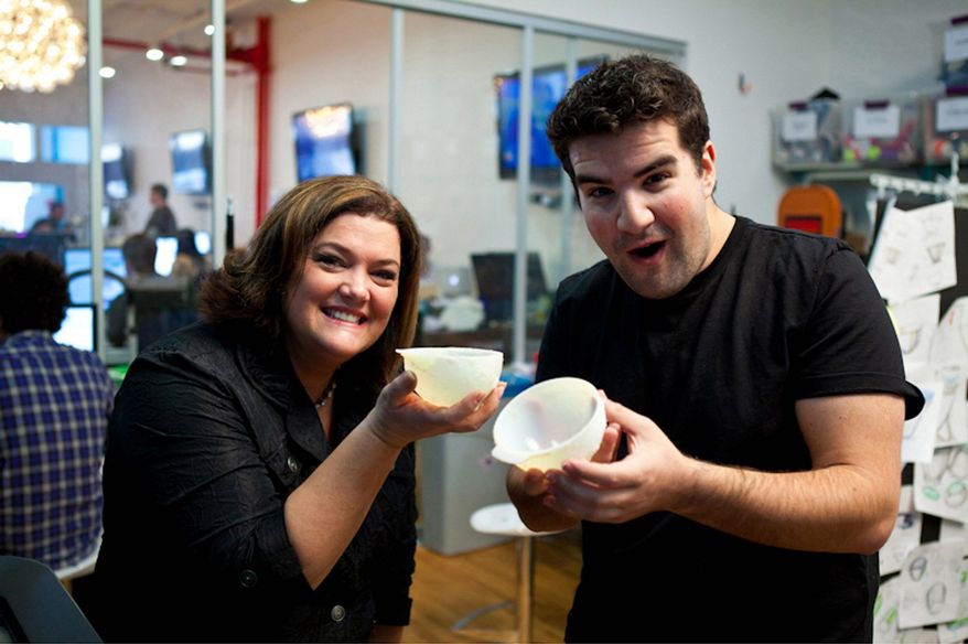 In this image released by the Sundance Channel, Ben Kaufman, founder and CEO id Quirky, right, is shown with Andrea Zabinski, holding her product called Ventu from the original series, "Quirky." The Ventu is a serving bowl that also allows you to strain excess moisture from fruit, salads and pasta. The series premieres Aug. 30, 2011 at 10 p.m. EST on Sundance Channel. (AP Photo/Sundance Channel, Christian Clothier)