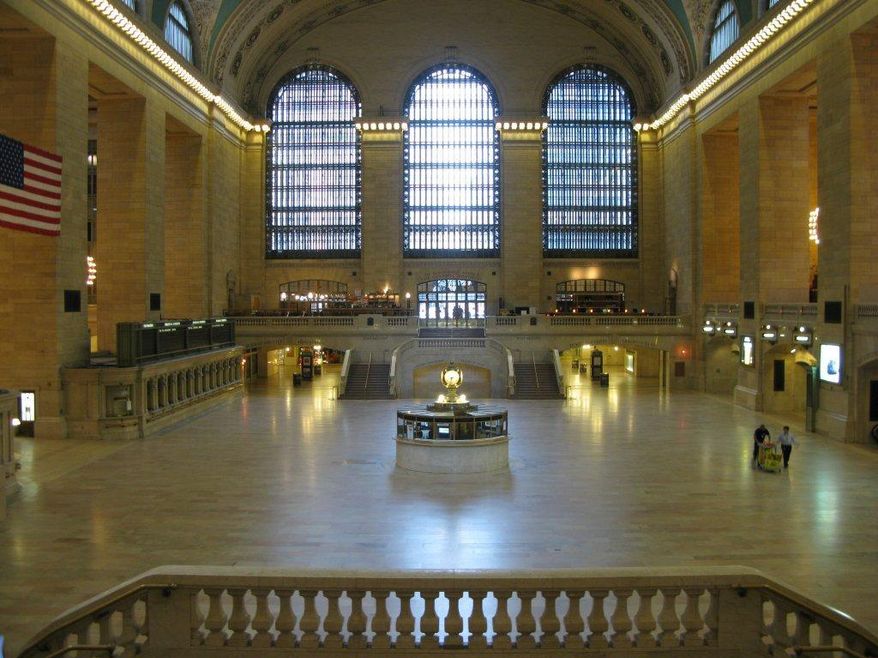 Two men push a cart through a deserted Grand Central Terminal in New York on Saturday, Aug. 27, 2011. The Metro North commuter railroad suspended service to the north of the city ahead of the arrival of Hurricane Irene. (AP Photo/Metropolitan Transportation Authority, Marjorie Anders)