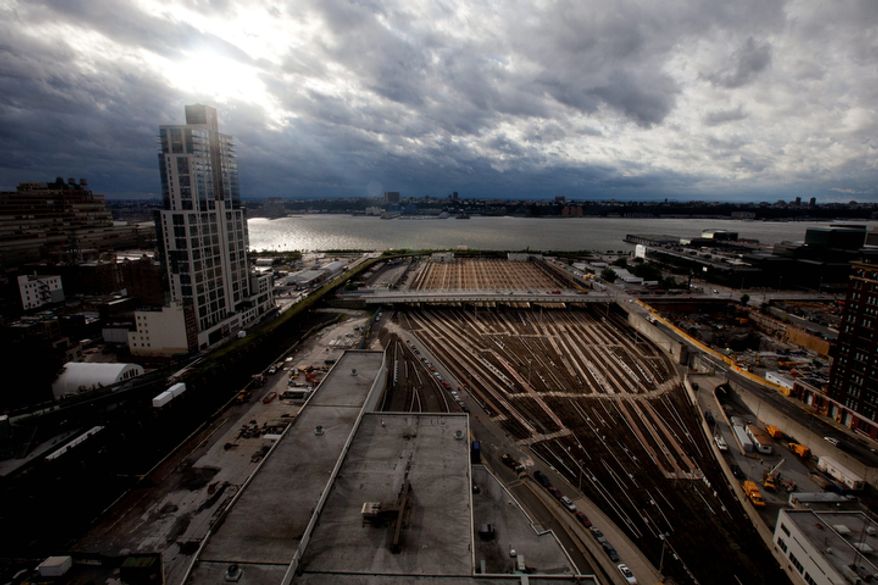 Empty train tracks are seen in New York City, Sunday, Aug. 28, 2011, after Tropical Storm Irene, downgraded from a hurricane, slammed the region earlier in the day. (AP Photo/Karly Domb Sadof)