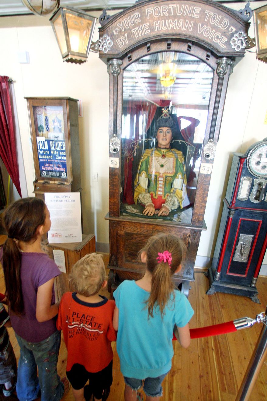 ASSOCIATED PRESS PHOTOGRAPHS
An antique Gypsy fortuneteller captivates the curious and attracts multiple collectors who are willing to pay millions of dollars for the machine, which some say could be the last of its kind.