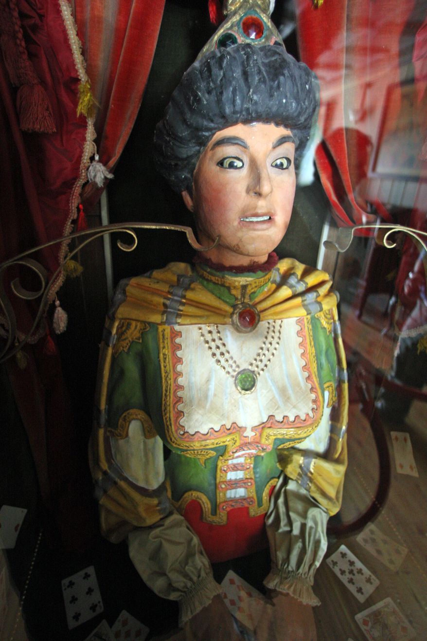 ASSOCIATED PRESS PHOTOGRAPHS
An antique Gypsy fortuneteller captivates the curious and attracts multiple collectors who are willing to pay millions of dollars for the machine, which some say could be the last of its kind.