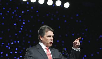 Republican presidential candidate Texas Gov. Rick Perry heard loud applause at the Veterans of Foreign Wars 112th National Conference on Monday when he said only U.S. officers should be leading American troops in missions abroad. (Associated Press)