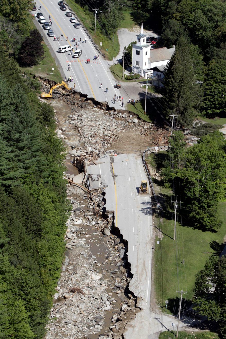 ASSOCIATED PRESS
This aerial photograph shows destruction of Route 4 in Killington, Vt., on Tuesday after Tropical Storm Irene passed through New England on Sunday.