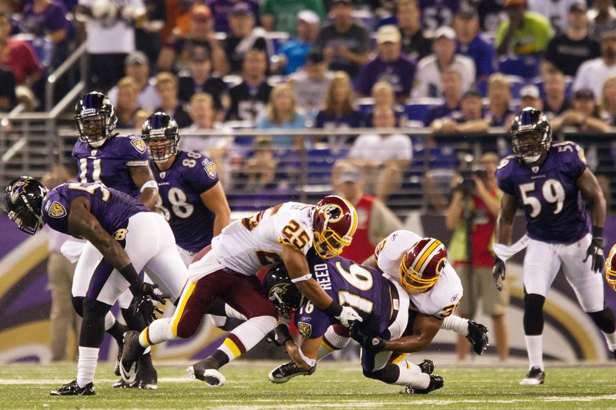ANDREW HARNIK/THE WASHINGTON TIMES
Running back Evan Royster (25), the sixth-round draft pick, is one of several Redskins rookies who could be on the bubble come Saturday.