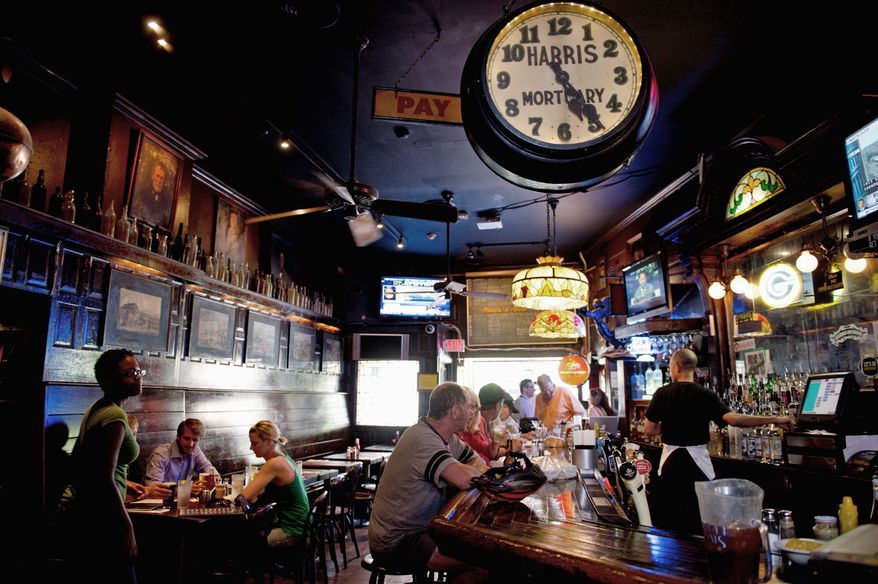 PHOTOGRAPHS BY BARBARA L. SALISBURY / THE WASHINGTON TIMES
After 44 years in business, the Hawk 'n' Dove bar on Capitol Hill will be closing down Oct. 2. There will be a series of events and celebrations before then and all of the bar's contents will be auctioned off. "They just found somebody else willing to pay more, and I can't afford to pay more," owner Stuart Long said.