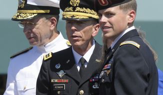 Adm. Mike Mullen (left), chairman of the Joint Chiefs of Staff, stands with (from second from left) U.S. Army Gen. David H. Petraeus; Holly Petraeus (partially hidden), the general&#x27;s wife; and 2nd Lt. Stephen Petraeus, Gen. and Mrs. Petraeus&#x27; son, during an armed forces farewell tribute and retirement ceremony for the general on Wednesday, Aug. 31, 2011, at Joint Base Myer-Henderson Hall in Arlington. (AP Photo/Susan Walsh)