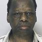 This booking photo from Aug. 24, 2011, shows Onyango Obama, who was arrested in Framingham, Mass., for several infractions, including operating a motor vehicle under the influence of alcohol. He is the uncle of President Obama. (Associated Press)