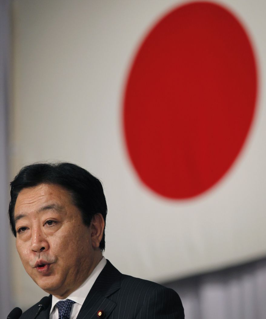 In this photo from Aug. 29, 2011, Yoshihiko Noda, new leader of the ruling Democratic Party of Japan, speaks during a press conference shortly after his election at a voting by the party lawmakers in Tokyo. (Associated Press)