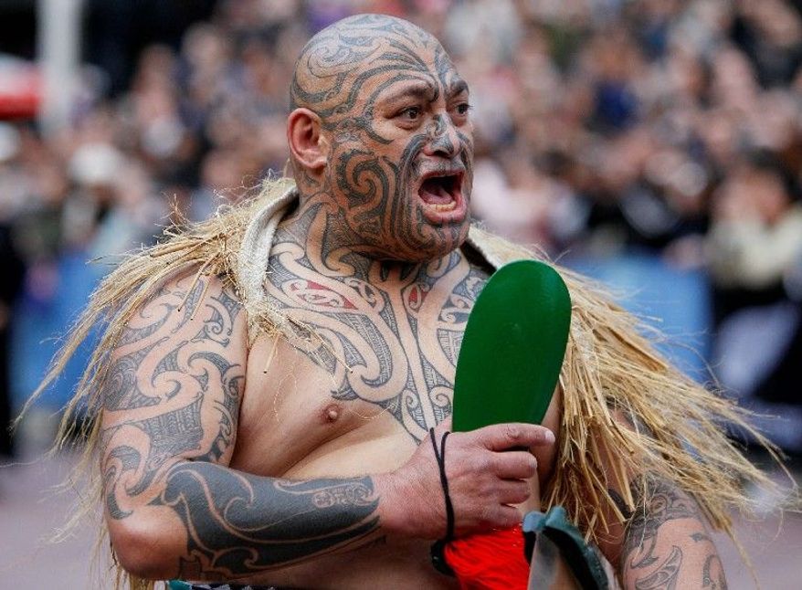 A native Maori warrior performs the haka - a traditional dance - at the welcoming. The All Blacks play Tonga in the opening game Friday.