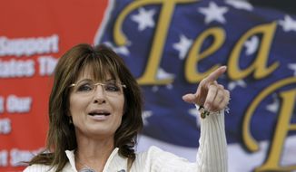 Former Alaska Gov. Sarah Palin speaks to tea party supporters during at a rally in Indianola, Iowa, on Saturday, Sept. 3, 2011. (AP Photo/Charlie Neibergall)