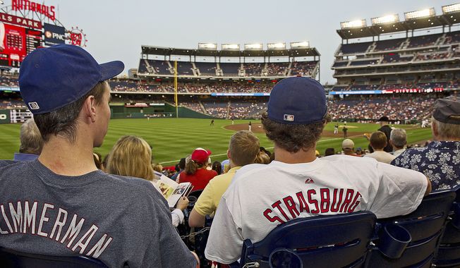 Photographs by Barbara L. Salisbury/The Washington Times
Washington Nationals fans display their favorites Friday while watching the Nats take on the New York Mets at home.