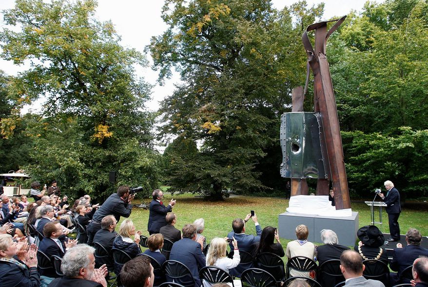 London Mayor Boris Johnson unveils &quot;After 9/11&quot; in Battersea Park in London on Monday. &quot;It is only if we and our children properly remember and understand 9/11 that we can make sure that nothing like it ever happens again,&quot; he said. (Associated Press)