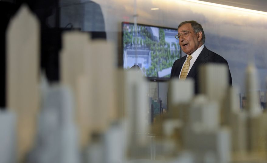 With a model of New York in the foreground, Defense Secretary Leon E. Panetta speaks to reporters after touring the National September 11 Memorial & Museum in New York on Tuesday, Sept. 6, 2011. (AP Photo/Susan Walsh, Pool)