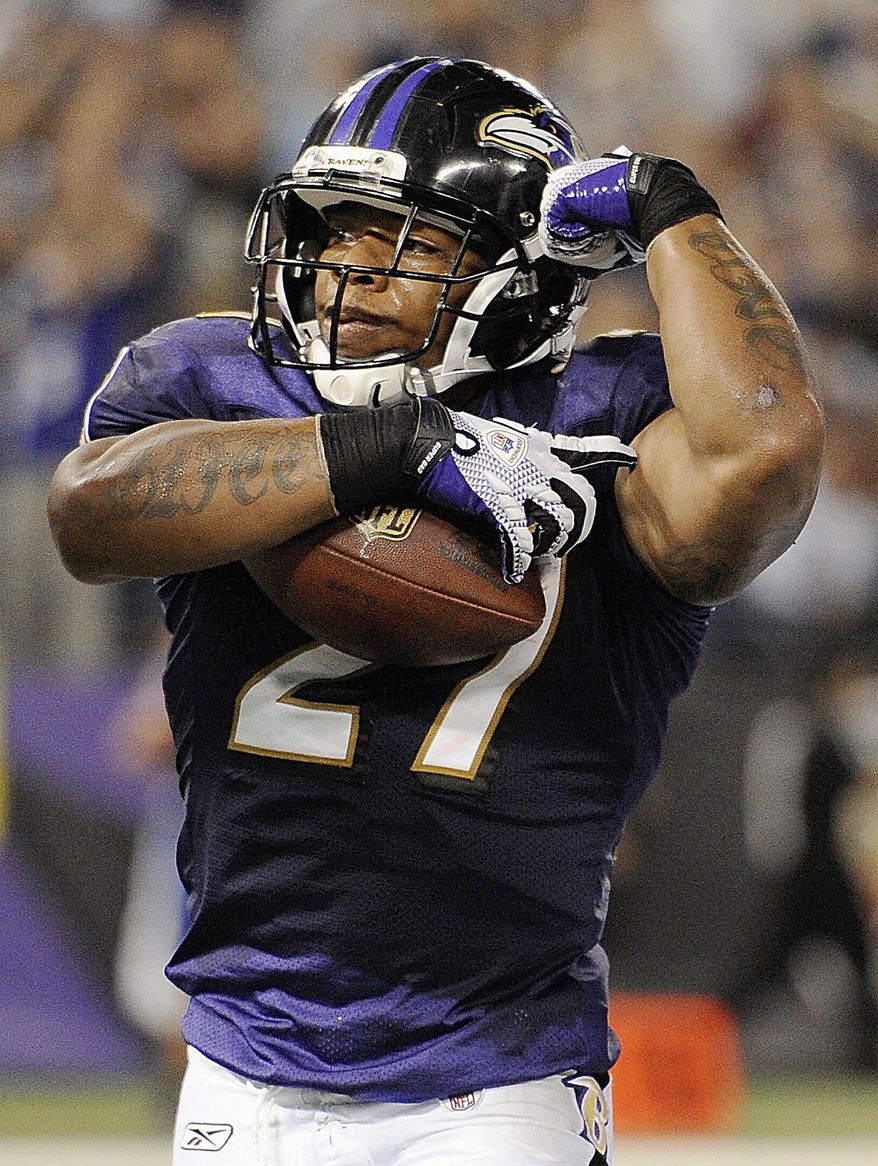 Ravens RB Ray Rice (above) figures to be a workhorse around the goal line with Willis McGahee now in Denver. The Eagles' Michael Vick (inset) is still a thrill-a-minute QB, but can his offensive line keep him upright? For yardage and TDs, you could do worse than hitching your wagon to Redskins RB Tim Hightower (below). (Associated Press photographs)