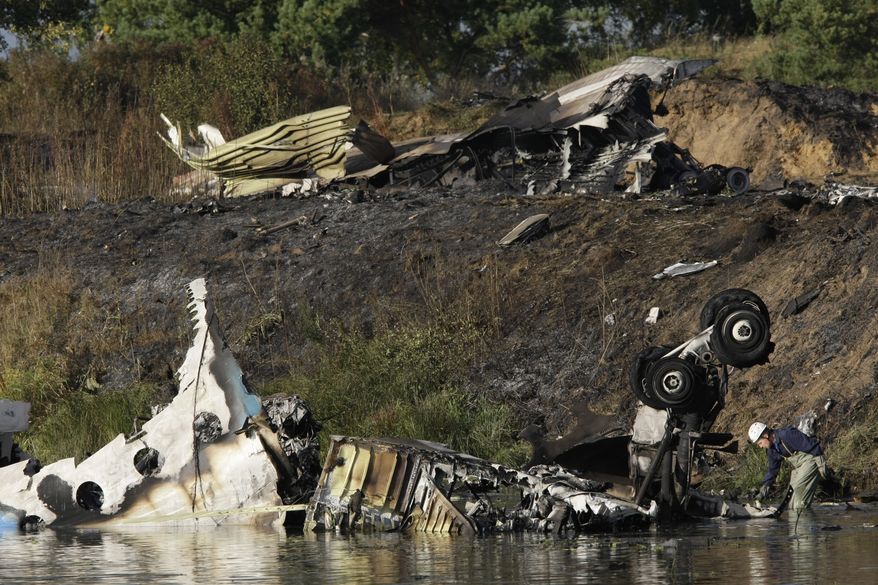 Wreckage of Russian Yak-42 jet is seen near the city of Yaroslavl, on the Volga River about 150 miles northeast of Moscow, on Sept. 7, 2011. The jet, carrying a top ice hockey team at the time, crashed while taking off, killing at least 43 people and leaving one critically injured, officials said. (Associated Press)
