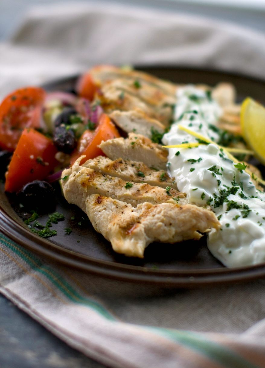 Elizabeth A. Karmel created this recipe, which is perfect for the end of summer when farmers markets and backyard gardens are bursting with cucumbers and tomatoes. (Associated Press)