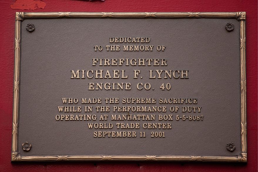 The firehouse at 66th and Amsterdam has a small garden honoring the firefighters who gave their lives in the 9/11 terrorist attacks in New York, NY, on Thursday September 1, 2011. (Andrew Harnik / The Washington Times)
