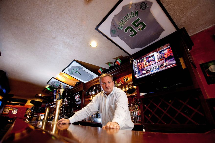 Jerseys with the names of firefighters who were killed in the terrorist attacks 10 years ago hang above the bar at Paul Hurley's restaurant, P.D. O'Hurley's, at 72nd and Broadway in New York. "You still think those guys are going to walk through that door," Mr. Hurley said.