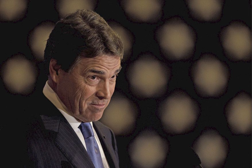 "We should never put our young men and women's lives at risk when American interests are not clearly defined by the president of the United States," Texas Gov. Rick Perry said during Wednesday's debate. (Associated Press)