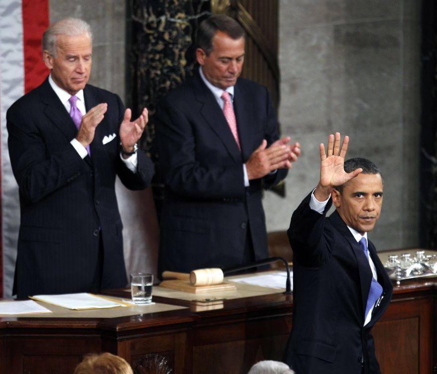 President Obama waves after speaking to a joint session of Congress at the Capitol in Washington, Thursday, Sept. 8, 2011. Vice President Joe Biden and House Speaker John Boehner applaud. (AP Photo/Evan Vucci)