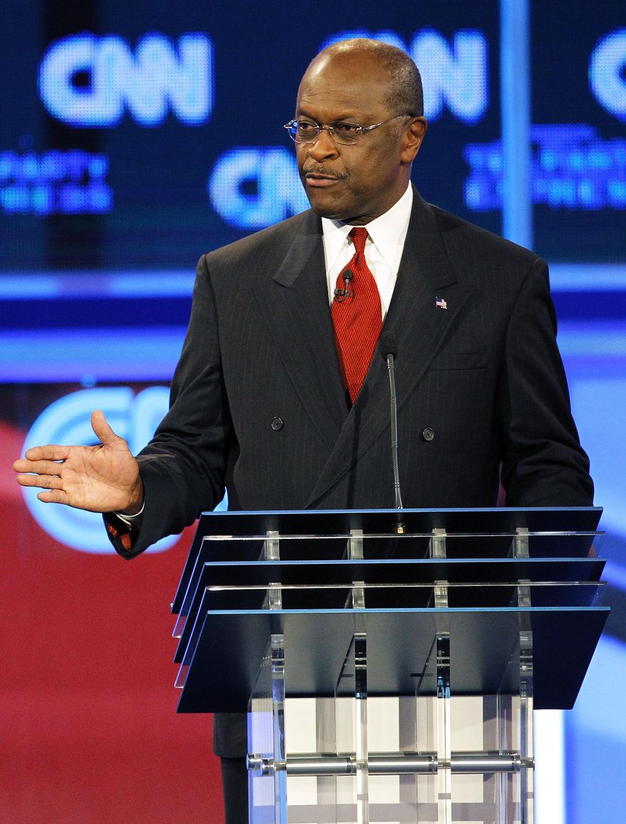 Republican presidential candidate Herman Cain gestures during a Republican presidential debate on Sept. 12, 2011 in Tampa, Fla. (Associated Press)