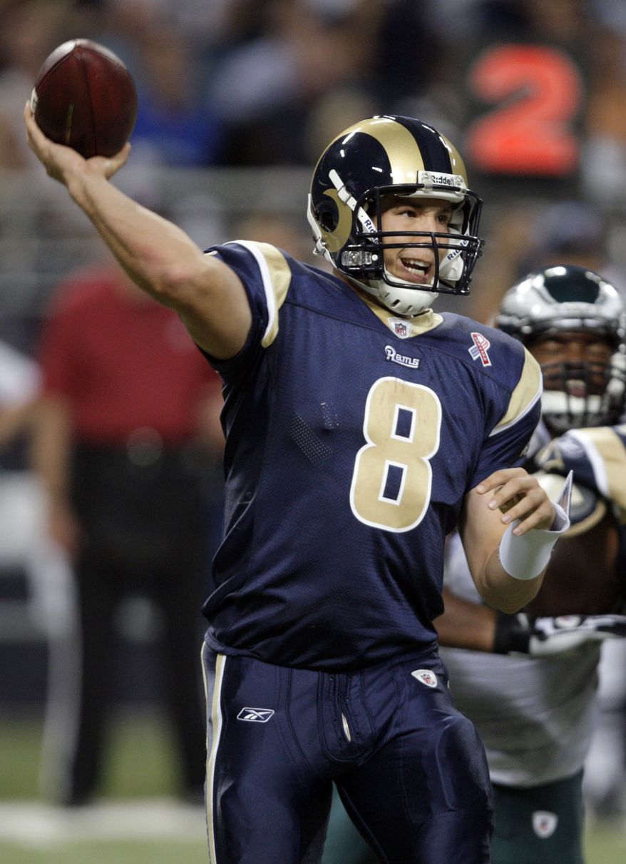 St. Louis Rams quarterback Sam Bradford bruised his right index finger against the Philadelphia Eagles on Sunday, but was back making all the throws in practice Wednesday. He says his finger is feeling "10 times better." (AP Photo/Tom Gannam)