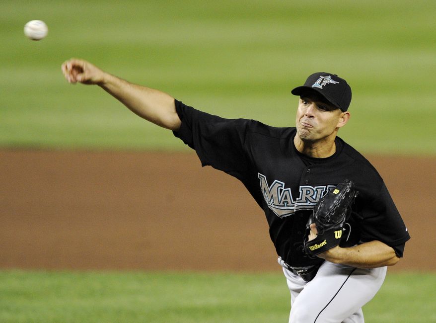 Florida Marlins starting pitcher Javier Vazquez pitched a complete-game shutout against the Washington Nationals on Friday. He struck out seven and allowed five hits. The Marlins won 3-0. (AP Photo/Nick Wass)