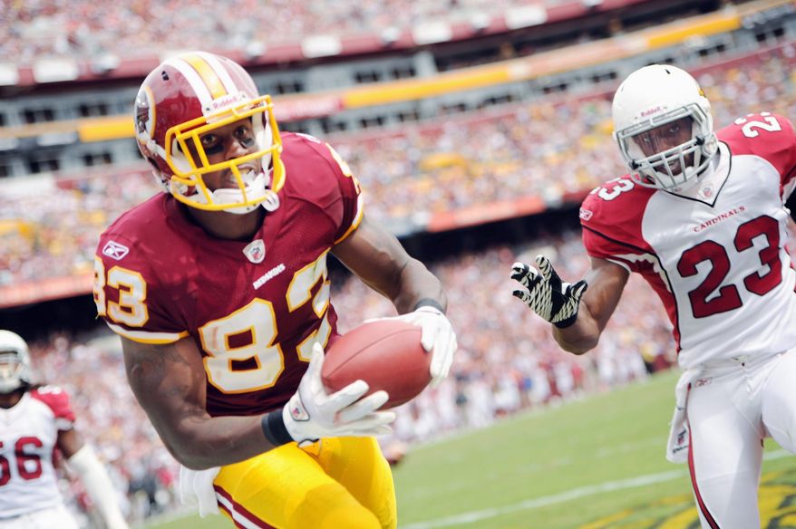 Redskins tight end Fred Davis, shown snaring a 1-yard touchdown pass Sunday, has 191 receiving yards the first two games. (Andrew Harnik/The Washington Times)
