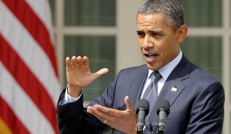 VETO VOW: President Obama said Monday that he would &quot;not support any plan that puts all the burden for closing our deficit on ordinary Americans,&quot; and called for higher taxes on the wealthiest. (Associated Press)