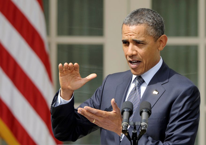 VETO VOW: President Obama said Monday that he would &quot;not support any plan that puts all the burden for closing our deficit on ordinary Americans,&quot; and called for higher taxes on the wealthiest. (Associated Press)