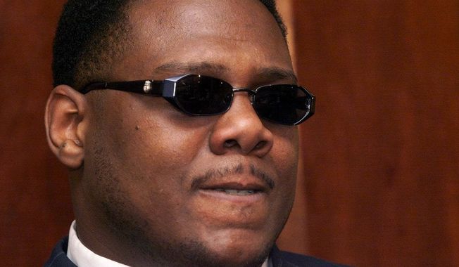 **FILE** This photo from March 29, 2001, shows former National Football League offensive tackle Orlando Brown during a news conference at his attorney&#x27;s office in New York to announce a $200 million lawsuit against the NFL. (Associated Press)