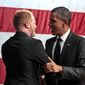 Actor Jesse Tyler Ferguson (left) introduces President Obama at a Democratic fundraiser at the House of Blues in West Hollywood, Calif., on Monday, Sept. 26, 2011. (AP Photo/Pablo Martinez Monsivais)