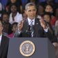 President Obama, accompanied by Education Secretary Arne Duncan (left), delivers his back-to school speech on Sept. 28, 2011, at Benjamin Banneker Academic High School in D.C. (Associated Press)