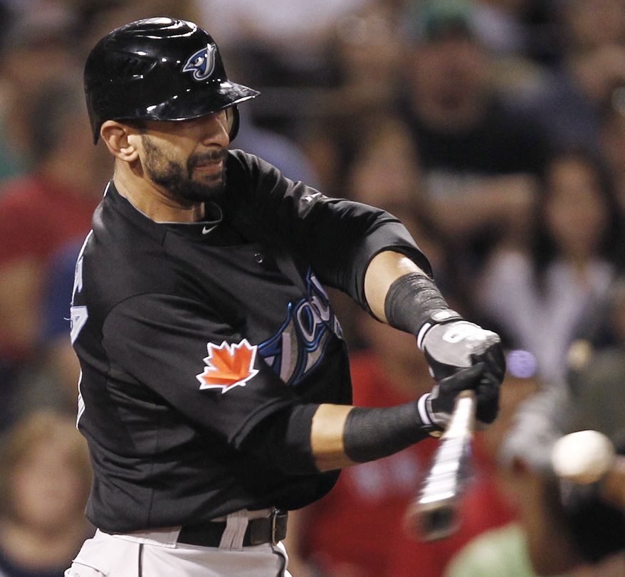 Toronto Blue Jays' Jose Bautista led the AL in home runs (43), had 103 RBI and batted .302, but will AL MVP voters be inclined to vote for a player on a losing team? (AP Photo/Winslow Townson)