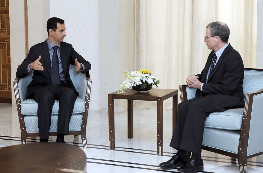** FILE ** Syrian President Bashar Assad (left) meets with Robert Ford, the new U.S. ambassador to Syria, in Damascus, Syria, on Thursday, Jan. 27, 2011. (AP Photo/Syrian Arab News Agency)