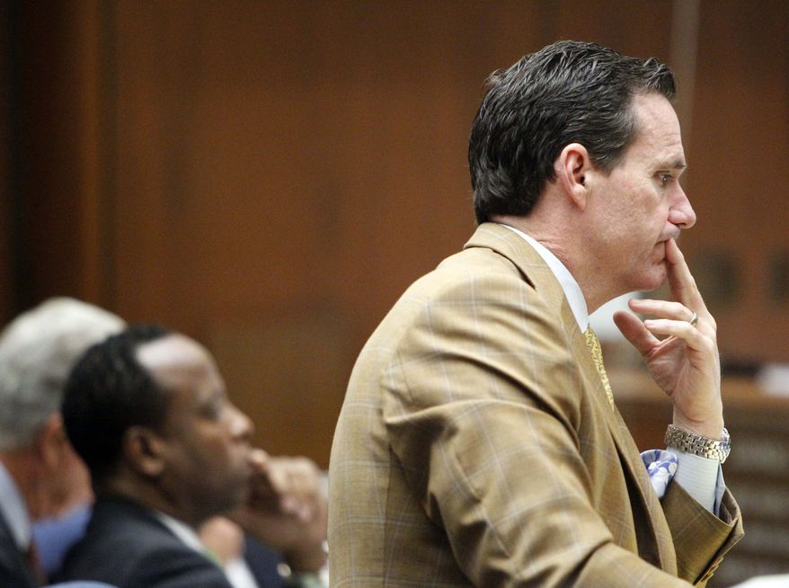Defense attorney Edward Chernoff questions Robert Russell, a former patient of Conrad Murray, during Murray's involuntary manslaughter trial in downtown Los Angeles, Friday, Sept. 30, 2011. (AP Photo/Al Seib, Pool)
