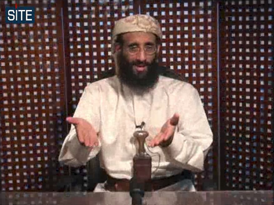 ** FILE ** In this file image taken from video and released by SITE Intelligence Group on Monday, Nov. 8, 2010, Anwar al-Awlaki speaks in a video message posted on radical websites. Yemen's Defense Ministry said in a statement Friday, Sept. 30, 2011, the U.S.-born al-Qaida cleric Anwar al-Awlaki has been killed. The ministry provided no details in the statement Friday on one of its websites. (AP Photo/SITE Intelligence Group)