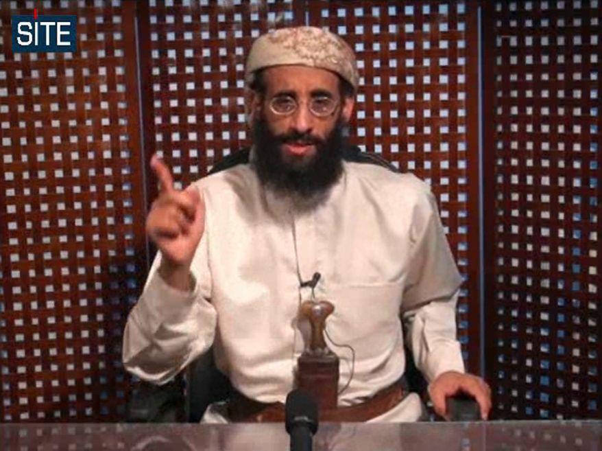 **FILE** In this image taken from video and released by SITE Intelligence Group on Nov. 8, 2010, Anwar al-Awlaki speaks in a video message posted on radical websites. (Associated Press)