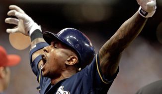 Milwaukee&#39;s Nyjer Morgan made a clutch catch against Arizona in Game 1 of their NL playoff series and delivered a two-run single in Game 2. The series shifts to Arizona for Game 3 on Tuesday. (Associated Press)