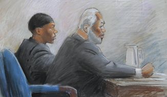 In this courtroom drawing, Umar Farouk Abdulmutallab (left) appears in federal court in Detroit on Oct. 4, 2011, with defense lawyer Anthony Chambers. Abdulmutallab is on trial for attempting to bring down a jetliner with a bomb in his underwear on Christmas 2009. (Associated Press)