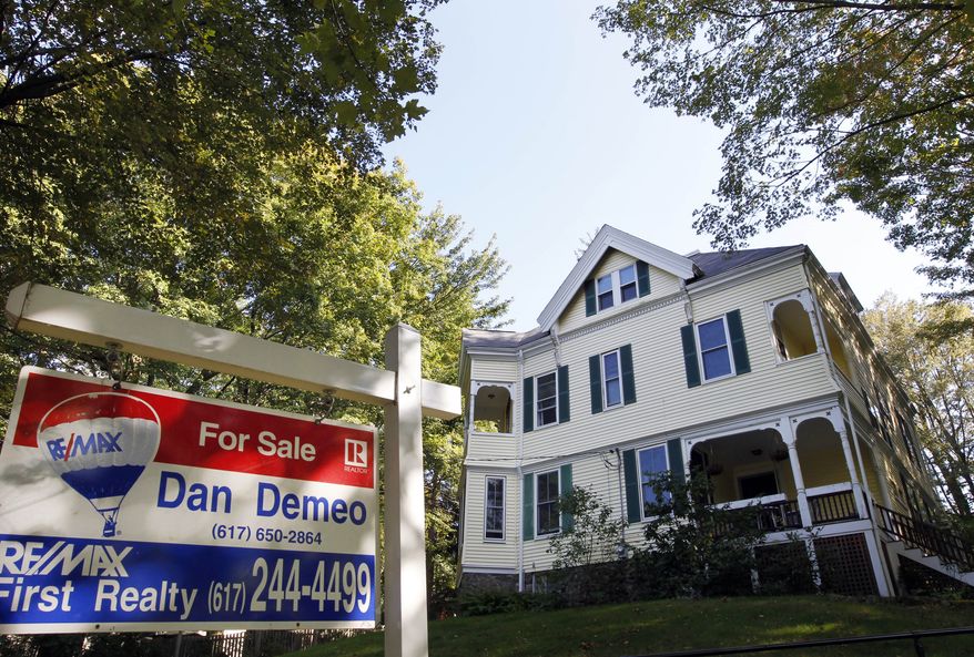 ** FILE ** A home in Newton, Mass., is up for sale on Monday, Sept. 19, 2011. (AP Photo/Steven Senne)