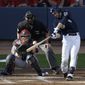 Milwaukee Brewers&#39; Ryan Braun hits a two-run home run during the first inning of Game 1 of baseball&#39;s National League championship series against the St. Louis Cardinals Sunday, Oct. 9, 2011, in Milwaukee. (AP Photo/Jeff Roberson)