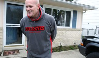 Samuel &quot;Joe the Plumber&quot; Wurzelbacher laughs while chatting with the media outside of his home in Holland, Ohio, in 2008. (Associated Press) ** FILE **