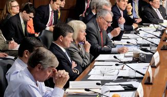 ** FILE ** The Joint Select Committee on Deficit Reduction meets on Capitol Hill last month. Supercommittee members (from left) are Rep. Fred Upton, Rep. Xavier Becerra, Rep. Jeb Hensarling, Sen. Patty Murray, Sen. Jon Kyl, Sen. Max Baucus, Sen. Rob Portman, Sen. John F. Kerry and Sen. Patrick J. Toomey. (Associated Press)