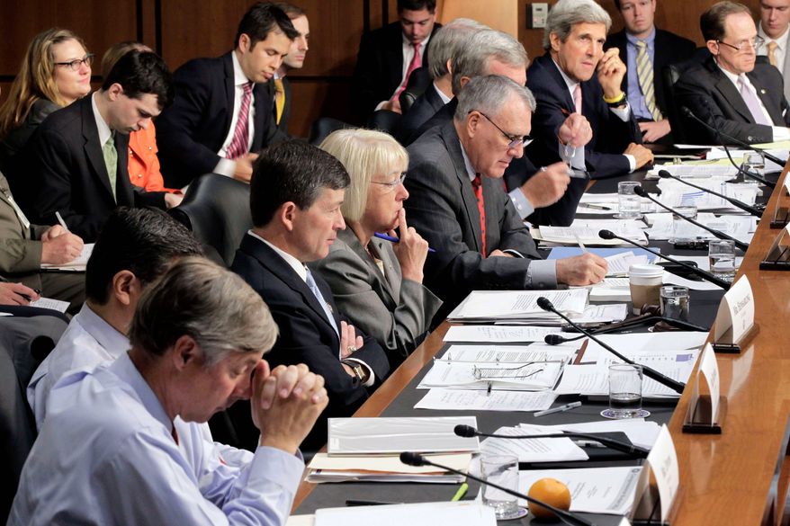 ** FILE ** The Joint Select Committee on Deficit Reduction meets on Capitol Hill last month. Supercommittee members (from left) are Rep. Fred Upton, Rep. Xavier Becerra, Rep. Jeb Hensarling, Sen. Patty Murray, Sen. Jon Kyl, Sen. Max Baucus, Sen. Rob Portman, Sen. John F. Kerry and Sen. Patrick J. Toomey. (Associated Press)