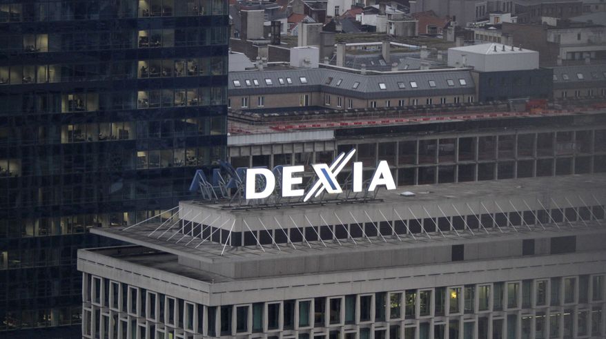 The Dexia logo sits atop the bank's headquarters in Brussels on Monday, Oct. 10, 2011. (AP Photo/Virginia Mayo)
