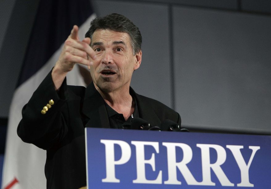 Texas Gov. Rick Perry speaks during the Johnson County GOP Fall BBQ at Clear Creek-Amana High School, on Oct. 7, 2011, in Tiffin, Iowa. (Associated Press)